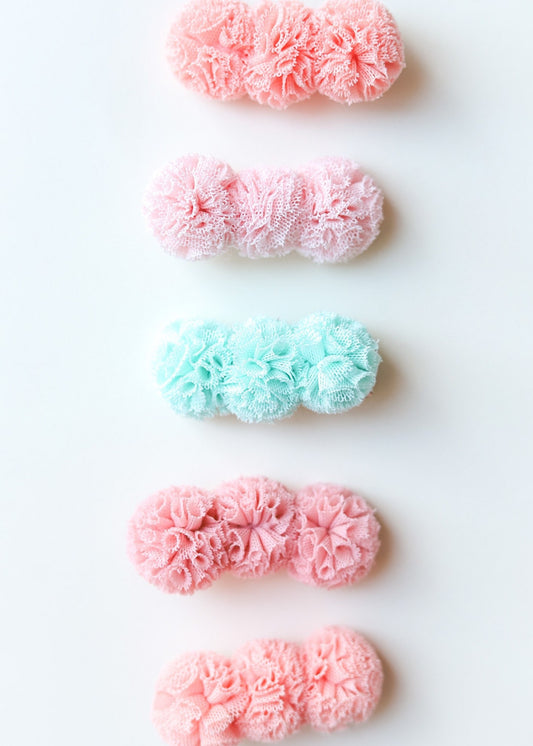 Pince pour cheveux à pompons